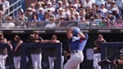 Chris Taylor of the Los Angeles Dodgers smacks a baseball