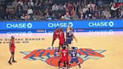 Houston Rockets guard James Harden beat New York Knicks forward Taj Gibson on opening tip
