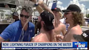 Nikita Kucherov pours beer on WFLA's Josh Benson during Tampa Bay Lightning Stanley Cup boat parade