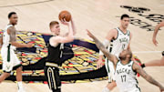 Kevin Huerter negociará con los Hawks