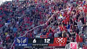 DC Defenders fans at Audi Field connect what could be the largest beer snake ever at the start of the fourth quarter Sunday.