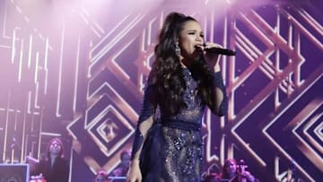 Angie en un concierto de La Academia 
