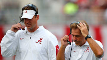 TUSCALOOSA, AL - SEPTEMBER 26: Head coach Nick Saban of the Alabama Crimson Tide and offensive coordinator Lane Kiffin converse against the Louisiana Monroe Warhawks at Bryant-Denny Stadium on September 26, 2015 in Tuscaloosa, Alabama. (Photo by Kevin C. Cox/Getty Images)