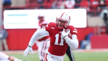 Nov 27, 2015; Lincoln, NE, USA; Nebraska Cornhuskers tight end Cethan Carter (11) runs for a first down during the first quarter against the Iowa Hawkeyes at Memorial Stadium. Mandatory Credit: Reese Strickland-USA TODAY Sports