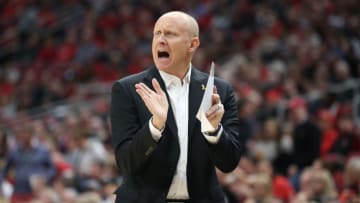 LOUISVILLE, KENTUCKY - JANUARY 25: Chris Mack the head coach of the Louisville Cardinals gives instructions to his team against the Clemson Tigers at KFC YUM! Center on January 25, 2020 in Louisville, Kentucky. (Photo by Andy Lyons/Getty Images)