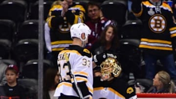 Nov 13, 2016; Denver, CO, USA; Boston Bruins goalie Tuukka Rask (40) and defenseman Zdeno Chara (33) celebrate the win over the Colorado Avalanche at Pepsi Center. The Bruins defeated the Avalanche 2-0. Mandatory Credit: Ron Chenoy-USA TODAY Sports