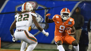 Clemson running back Travis Etienne (9) carries against Miami during the 1st quarter of the ACC championship game against Miami at Bank of America Stadium in Charlotte on Saturday, December 2, 2017.Acc Championship