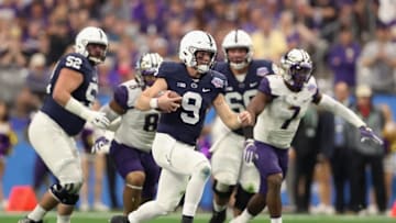 GLENDALE, AZ - DECEMBER 30: Quarterback Trace McSorley #9 of the Penn State Nittany Lions scrambles with the football against the Washington Huskies during the Playstation Fiesta Bowl at University of Phoenix Stadium on December 30, 2017 in Glendale, Arizona. The Nittany Lions defeated the Huskies 35-28. (Photo by Christian Petersen/Getty Images)
