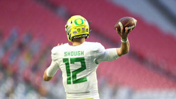 Jan 2, 2021; Glendale, AZ, USA; Oregon Ducks quarterback Tyler Shough (12) against the Iowa State Cyclones in the Fiesta Bowl at State Farm Stadium. Mandatory Credit: Mark J. Rebilas-USA TODAY Sports