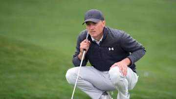 Feb 14, 2021; Pebble Beach, California, USA; Jordan Spieth lines up a putt on the third green during the final round of the AT&T Pebble Beach Pro-Am golf tournament at Pebble Beach Golf Links. Mandatory Credit: Orlando Ramirez-USA TODAY Sports