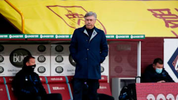 Everton's Italian head coach Carlo Ancelotti watches his players from the touchline during the English Premier League football match between Burnley and Everton at Turf Moor in Burnley, north west England on December 5, 2020. (Photo by Clive Brunskill / POOL / AFP) / RESTRICTED TO EDITORIAL USE. No use with unauthorized audio, video, data, fixture lists, club/league logos or 'live' services. Online in-match use limited to 120 images. An additional 40 images may be used in extra time. No video emulation. Social media in-match use limited to 120 images. An additional 40 images may be used in extra time. No use in betting publications, games or single club/league/player publications. / (Photo by CLIVE BRUNSKILL/POOL/AFP via Getty Images)