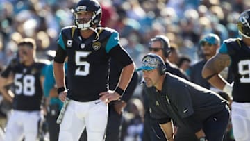 Nov 29, 2015; Jacksonville, FL, USA; Jacksonville Jaguars quarterback Blake Bortles (5) and head coach Gus Bradley look on during the third quarter against the San Diego Chargers at EverBank Field. The San Diego Chargers won 31-25. Mandatory Credit: Logan Bowles-USA TODAY Sports