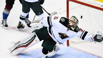 Oct 4, 2016; Denver, CO, USA; Minnesota Wild goalie Darcy Kuemper (35) is unable to make a save on a shot by Colorado Avalanche defenseman Chris Bigras (3) (not pictured) in the second period during a preseason hockey game at the Pepsi Center. Mandatory Credit: Ron Chenoy-USA TODAY Sports