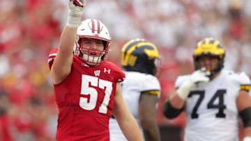 Badgers inside linebacker Jack Sanborn celebrates a tackle during the first half against Michigan.Mjs Uwgrid Uwgrid22 01869