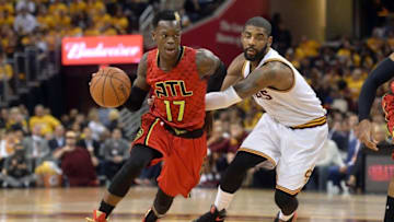 May 2, 2016; Cleveland, OH, USA; Atlanta Hawks guard Dennis Schroder (17) drives past Cleveland Cavaliers guard Kyrie Irving (2) during the second half in game one of the second round of the NBA Playoffs at Quicken Loans Arena. The Cavs won 104-93. Mandatory Credit: Ken Blaze-USA TODAY Sports