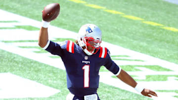 FOXBOROUGH, MASSACHUSETTS - SEPTEMBER 13: Cam Newton #1 of the New England Patriots celebrates rushing for a 4-yard touchdown during the second quarter against the Miami Dolphins at Gillette Stadium on September 13, 2020 in Foxborough, Massachusetts. (Photo by Maddie Meyer/Getty Images)