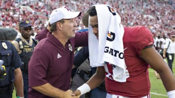 TUSCALOOSA, AL - SEPTEMBER 22: Tua Tagovailoa #13 of the Alabama Crimson Tide shakes hands after the game with Head Coach Jimbo Fisher of the Texas A&M Aggies at Bryant-Denny Stadium on September 22, 2018 in Tuscaloosa, Alabama. The Crimson Tide defeated the Aggies 45-23. (Photo by Wesley Hitt/Getty Images)