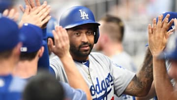 ATLANTA, GA - JULY 27: Matt Kemp #27 of the Los Angeles Dodgers is congratulated by teammates after scoring a fourth inning run against the Atlanta Braves at SunTrust Park on July 27, 2018 in Atlanta, Georgia. (Photo by Scott Cunningham/Getty Images)