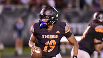 Belleville's Bryce Underwood rushes during the Xenith Prep Kickoff Classic against Novi on Friday, Aug. 26, 2022, at Wayne State University.Photo Aug 26 7 47 14 Pm