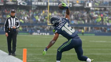 SEATTLE, WA - OCTOBER 20: Wide receiver Tyler Lockett #16 of the Seattle Seahawks spikes the ball after scoring a touchdown in the second quarter against the Baltimore Ravens at CenturyLink Field on October 20, 2019 in Seattle, Washington. (Photo by Otto Greule Jr/Getty Images)