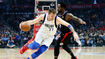 LOS ANGELES, CA - FEBRUARY 25: Luka Doncic #77 of the Dallas Mavericks handles the ball against the LA Clippers on February 25, 2019 at STAPLES Center in Los Angeles, California. NOTE TO USER: User expressly acknowledges and agrees that, by downloading and/or using this Photograph, user is consenting to the terms and conditions of the Getty Images License Agreement. Mandatory Copyright Notice: Copyright 2019 NBAE (Photo by Chris Elise/NBAE via Getty Images)