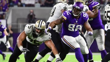 MINNEAPOLIS, MN - SEPTEMBER 11: Minnesota Vikings defensive tackle Tom Johnson (92) attempts to get around New Orleans Saints offensive tackle Andrus Peat (75) during a NFL game between the Minnesota Vikings and New Orleans Saints on September 11, 2017 at U.S. Bank Stadium in Minneapolis, MN. The Vikings defeated the Saints 29-19.(Photo by Nick Wosika/Icon Sportswire via Getty Images)