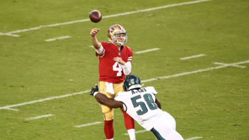 SANTA CLARA, CALIFORNIA - OCTOBER 04: Nick Mullens #4 of the San Francisco 49ers pass the ball against Genard Avery #58 of the Philadelphia Eagles in the game at Levi's Stadium on October 04, 2020 in Santa Clara, California. (Photo by Ezra Shaw/Getty Images)