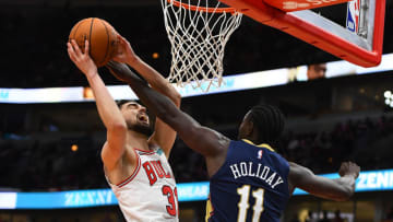 Tomas Satoransky #31 of the Chicago Bulls is fouled by Jrue Holiday #11 of the New Orleans Pelicans (Photo by Stacy Revere/Getty Images)