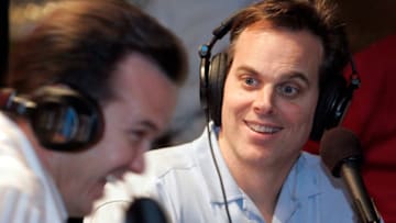 Colin Cowherd(light blue shirt), ESPN morning show sports personality is in Los Angeles in the leading to the USC?Notre Dame game. He is stopping by for an appearance with evening show hosts Steve Mason(not pictured)and John Ireland(left) at the Liberty Grill broadcasting live. (Photo by Lawrence K. Ho/Los Angeles Times via Getty Images)