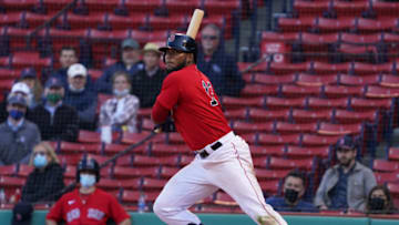 May 6, 2021; Boston, Massachusetts, USA; Boston Red Sox center fielder Franchy Cordero (16) gets a base hit against the Detroit Tigers in the eighth inning at Fenway Park. Mandatory Credit: David Butler II-USA TODAY Sports