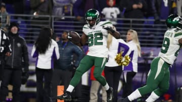 BALTIMORE, MARYLAND - DECEMBER 12: Wide receiver Jamison Crowder #82 of the New York Jets scores a touchdown during the fourth quarter against the Baltimore Ravens at M&T Bank Stadium on December 12, 2019 in Baltimore, Maryland. (Photo by Todd Olszewski/Getty Images)