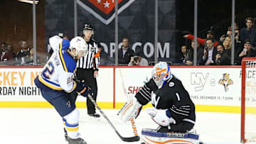 Dec 4, 2015; Brooklyn, NY, USA; New York Islanders goalie Thomas Greiss (1) makes a save on a shot by St. Louis Blues defenseman Kevin Shattenkirk (22) during shootout at Barclays Center. New York Islanders won 2-1 in shootout. Mandatory Credit: Anthony Gruppuso-USA TODAY Sports