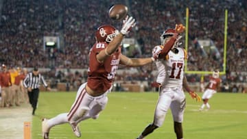 Nov 7, 2015; Norman, OK, USA; Oklahoma Sooners tight end Mark Andrews (81) dives for a pass in the end zone while being defended by Iowa State Cyclones defensive back Jomal Wiltz (17) during the second quarter at Gaylord Family - Oklahoma Memorial Stadium. Mandatory Credit: Mark D. Smith-USA TODAY Sports