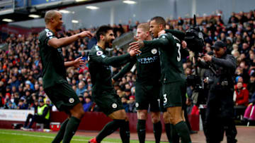 BURNLEY, ENGLAND - FEBRUARY 03: Danilo of Manchester City celebrates after scoring his sides first goal with his Manchester City team mates during the Premier League match between Burnley and Manchester City at Turf Moor on February 3, 2018 in Burnley, England. (Photo by Clive Brunskill/Getty Images)