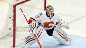 Mar 5, 2016; Pittsburgh, PA, USA; Calgary Flames goalie Joni Ortio (37) guards the net against the Pittsburgh Penguins during the second period at the CONSOL Energy Center. The Flames won 4-2. Mandatory Credit: Charles LeClaire-USA TODAY Sports