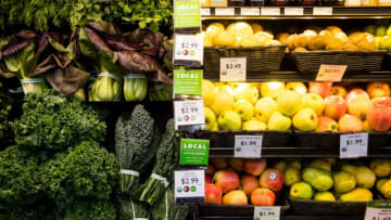 Green tags labeled with "LOCAL" tell customers where in East Tennessee products are from at Three Rivers Market in the Happy Holler area of Knoxville.1212threerivers Bp Jpg