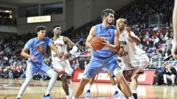 CHESTNUT HILL, MA - MARCH 05: North Carolina Tar Heels forward Luke Maye (32) tries to get past Boston College Eagles forward Steffon Mitchell (41) in the paint. During the North Carolina Tar Heels game against the Boston College Eagles on March 05, 2019 at Conte Forum in Chestnut Hill, MA.(Photo by Michael Tureski/Icon Sportswire via Getty Images)