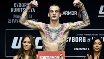 LAS VEGAS, NV - MARCH 02: Sean O'Malley poses on the scale during a UFC 222 weigh-in on March 2, 2018 in Las Vegas, Nevada. (Photo by Jeff Bottari/Zuffa LLC/Zuffa LLC via Getty Images)