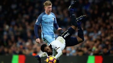 MANCHESTER, ENGLAND - JANUARY 21: Kevin De Bruyne of Manchester City (L) fouls Danny Rose of Tottenham Hotspur (R) during the Premier League match between Manchester City and Tottenham Hotspur at Etihad Stadium on January 21, 2017 in Manchester, England. (Photo by Clive Mason/Getty Images)