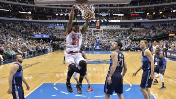 Feb 3, 2016; Dallas, TX, USA; Miami Heat center Hassan Whiteside (21) dunks the ball against the Dallas Mavericks during the game at the American Airlines Center. The Heat defeat the Mavericks 93-90. Mandatory Credit: Jerome Miron-USA TODAY Sports