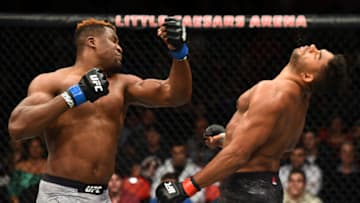 DETROIT, MI - DECEMBER 02: (L-R) Francis Ngannou of Cameroon punches Alistair Overeem of The Netherlands in their heavyweight bout during the UFC 218 event inside Little Caesars Arena on December 02, 2017 in Detroit, Michigan. (Photo by Josh Hedges/Zuffa LLC/Zuffa LLC via Getty Images)