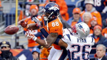 Jan 24, 2016; Denver, CO, USA; Denver Broncos wide receiver Demaryius Thomas (88) catches a pass as New England Patriots cornerback Logan Ryan (26) defends in the AFC Championship football game at Sports Authority Field at Mile High. Mandatory Credit: Kevin Jairaj-USA TODAY Sports