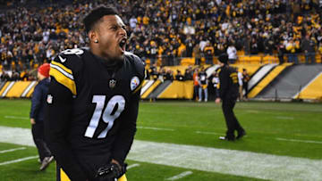 PITTSBURGH, PA - DECEMBER 30: JuJu Smith-Schuster #19 of the Pittsburgh Steelers reacts as he watches the Cleveland Browns play the Baltimore Ravens on the scoreboard at Heinz Field following the Steelers 16-13 win over the Cincinnati Bengals on December 30, 2018 in Pittsburgh, Pennsylvania. (Photo by Joe Sargent/Getty Images)