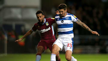 LONDON, ENGLAND - OCTOBER 26: Neil Taylor of Aston Villa and Pawel Wszolek clash during the Sky Bet Championship match between Queens Park Rangers and Aston Villa at Loftus Road on October 26, 2018 in London, England. (Photo by Alex Pantling/Getty Images)
