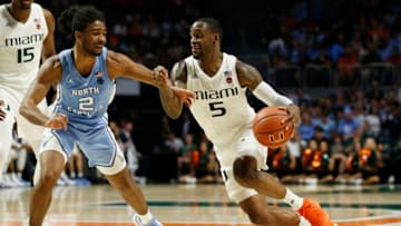 MIAMI, FLORIDA - JANUARY 19: Zach Johnson #5 of the Miami Hurricanes drives to the basket against the North Carolina Tar Heels during the second half at Watsco Center on January 19, 2019 in Miami, Florida. (Photo by Michael Reaves/Getty Images)