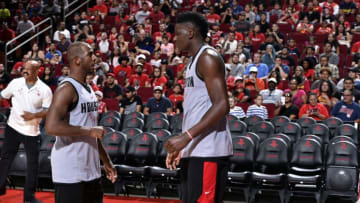 HOUSTON, TX - OCTOBER 7: Chris Paul #3 and Clint Capela #15 of the Houston Rockets participate in the team's annual Fan Fest event on October 7, 2017 at the Toyota Center in Houston, Texas. NOTE TO USER: User expressly acknowledges and agrees that, by downloading and or using this photograph, user is consenting to the terms and conditions of the Getty Images License Agreement. Mandatory Copyright Notice: Copyright 2017 NBAE (Photo by Bill Baptist/NBAE via Getty Images)
