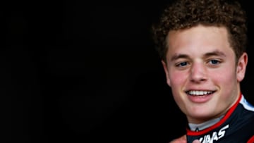 NORTHAMPTON, ENGLAND - JULY 07: Santino Ferrucci of USA and Haas F1 poses for a photo outside the Haas F1 garage during previews ahead of the Formula One Grand Prix of Great Britain at Silverstone on July 7, 2016 in Northampton, England. (Photo by Charles Coates/Getty Images)