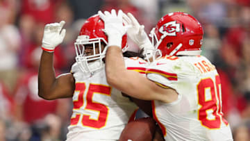 GLENDALE, AZ - DECEMBER 07: Tight end Anthony Fasano #80 of the Kansas City Chiefs celebrates a touchdown with running back Jamaal Charles #25 during the second quarter of the NFL game against the Arizona Cardinals at the University of Phoenix Stadium on December 7, 2014 in Glendale, Arizona. (Photo by Christian Petersen/Getty Images)