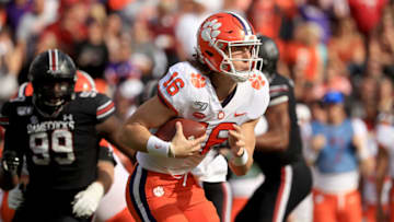 COLUMBIA, SOUTH CAROLINA - NOVEMBER 30: Trevor Lawrence #16 of the Clemson Tigers runs with the ball against the South Carolina Gamecocks during their game at Williams-Brice Stadium on November 30, 2019 in Columbia, South Carolina. (Photo by Streeter Lecka/Getty Images)