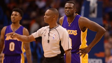Oct 30, 2016; Oklahoma City, OK, USA; Los Angeles Lakers forward Luol Deng (9) reacts to a call in action against the Oklahoma City Thunder during the first quarter at Chesapeake Energy Arena. Mandatory Credit: Mark D. Smith-USA TODAY Sports